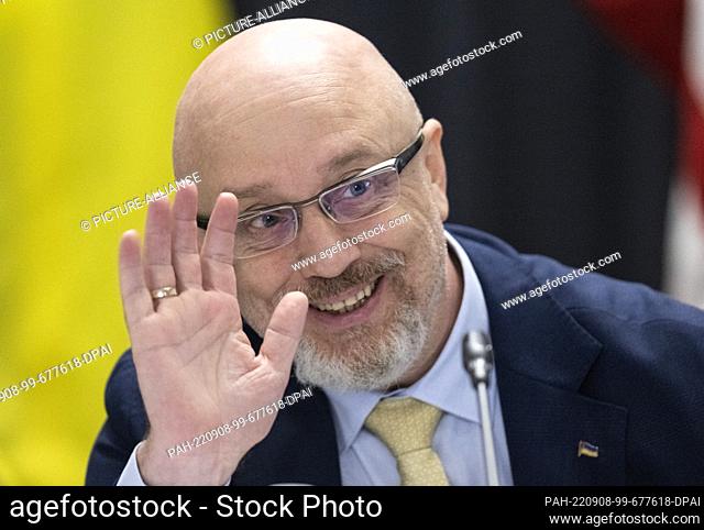 08 September 2022, Rhineland-Palatinate, Ramstein: Ukrainian Defense Minister Olexiy Resnikov greets other participants at the start of the Ukraine Conference...