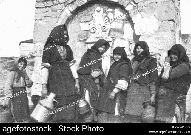 'Impressions Macedoniennes; Femmes tziganes a la fontaine dans un village grec.', 1915. Creator: Unknown
