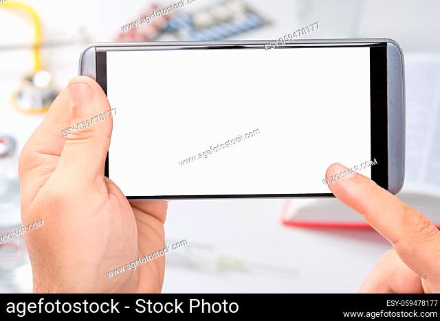 Smartphone with empty white display with a medical background