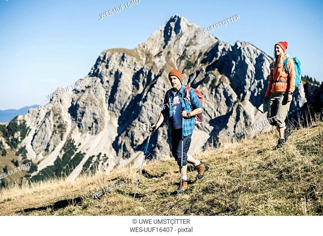 Austria, Tyrol, couple hiking in the mountains
