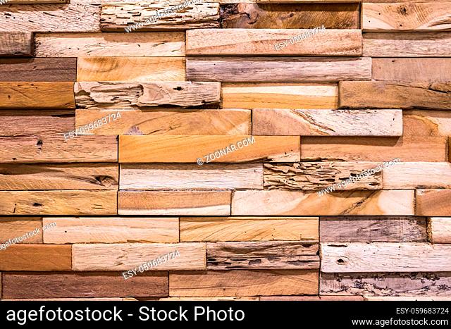 Small pieces of pine Arranged together into a beautiful wooden wall For interior decoration of buildings or floors and web backgrounds, Old wood wall texture