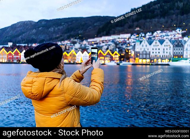 Woman taking a selfie, Bergen, Norway