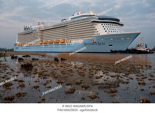 The newest cruise ship of the Meyer dockyard called 'Ovation of the Seas' being transferred via the narrow Ems river to the North Sea, Papenburg, Germany