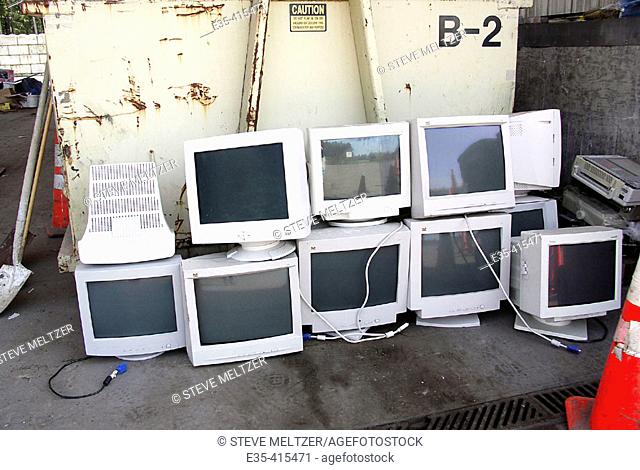 Old monitors at garbage dump. Gig Harbor, Washington, USA. Computer monitors contain biohazard chemicals