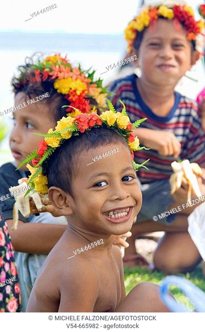 Yapese children wearing traditional Leis (flower garlands), Bechiyal Village, Federated States of Micronesia