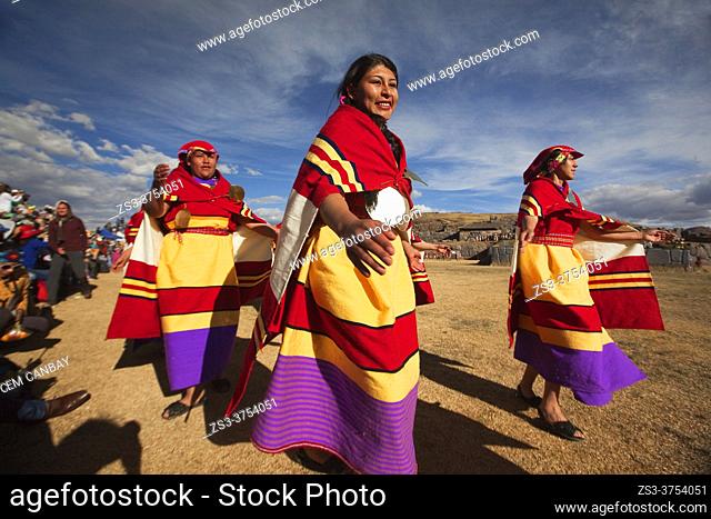 Indigenous people with traditional costumes during a performance at the Inti Raymi Festival 2018 in Saqsaywaman Archaeological Site, Cusco, Peru, South America