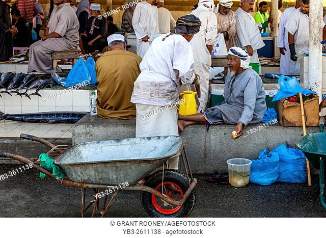 Omani Men At The Fish Market, Muttrah, Muscat, Sultanate Of Oman