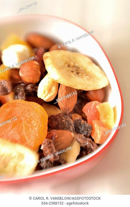 Healthy snacks: bowl of mixed nuts and dried fruits. Shot with LensBaby for selective focus