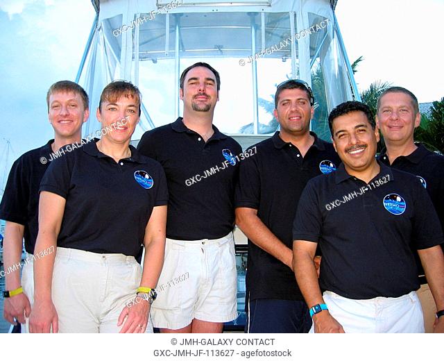 NEEMO 12 crewmembers and habitat technicians take a moment to pose for a group photo during preparations for their stay inside the Aquarius Underwater...