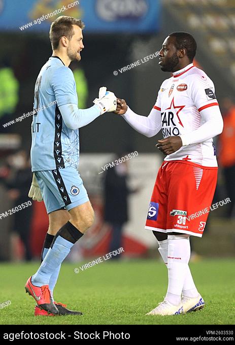 Club's goalkeeper Simon Mignolet and Mouscron's Harlem Gnohere pictured after the Jupiler Pro League match between Royal Excel Mouscron and Club Brugge KV