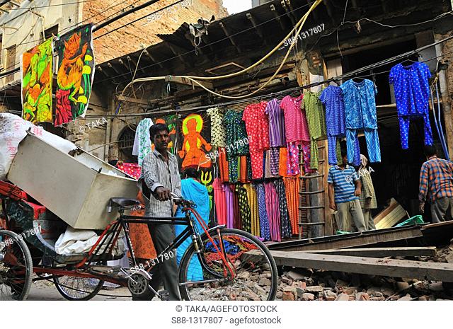 Main shopping street Paharganj where is front of New Delhi satiation, is on big road work Width of the street got wider All the shops facing to the street had...