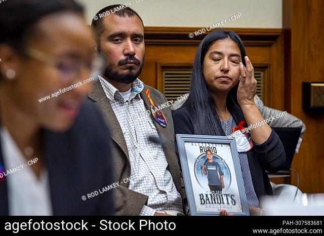 Felix Rubio, center, and Kimberly Rubio, right, whose daughter Alexandria Rubio was one of the children killed by a gunman at Robb Elementary School in Uvalde
