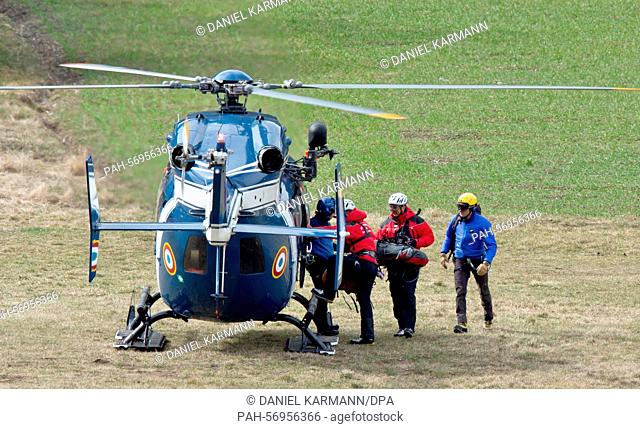 Alpine climbers take off for the crash site in a police helicopter near Seyne Les Alpes, France, 25 March 2015. After the crash of the Germanwings airplane