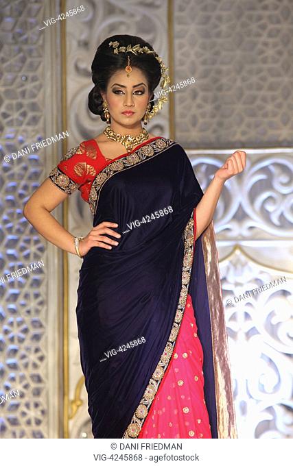 CANADA, SCARBOROUGH, 04.01.2014, An Indian fashion model showcases a saree from the Kharisma Saree Collection during a South Asian bridal fashion show