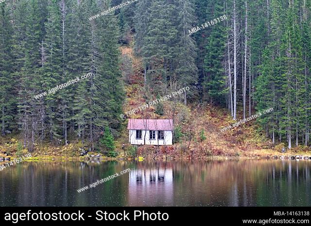 abandoned forest hut by a lake, near ã…kervika, lapland, norway