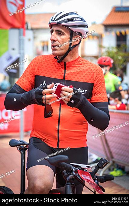 Former cyclist Miguel Induráin at the start line of the race in Madrid, Spain Jun 13, 2020. The former Tour de France winner cyclist competes in a MTB time...