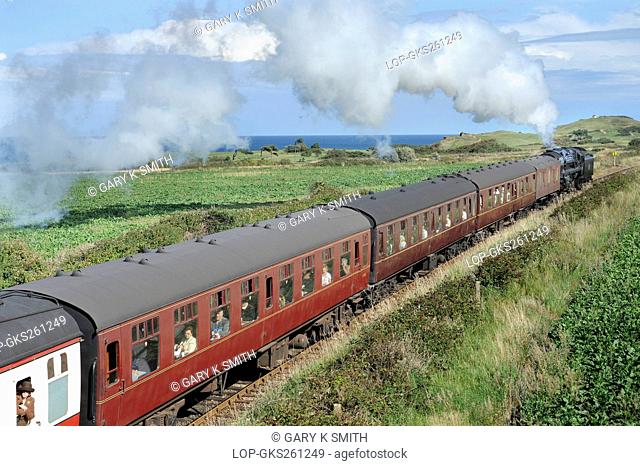 England, Norfolk. A steam train on the North Norfolk Railway NNR, a steam heritage railway also known as the 'Poppy line'
