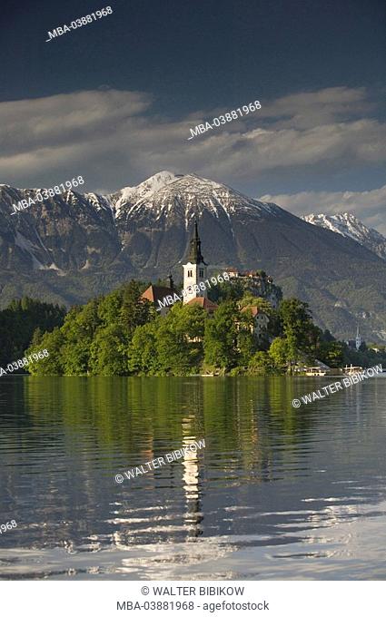 Slovenia, region Gorenjska, Bleder See, Lake Bled, island Blejski otok, church, Saint Maria in the lake, mountain, clouded sky, Oberkrain, waters, Veldeser lake
