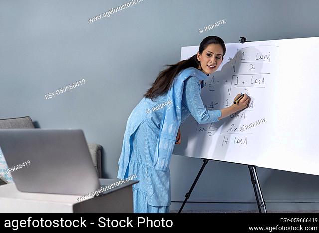 A woman teaching in an online class