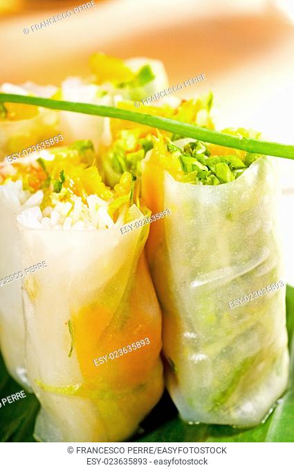 fresh tipycal vietnamese style summer rolls, on a palm leaf
