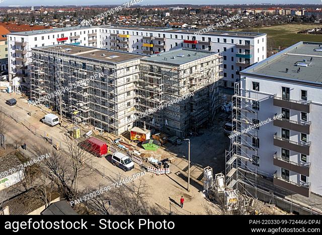 08 March 2022, Saxony, Leipzig: After the partial removal of the scaffolding, the new buildings of the Leipziger Wohnungs- und Baugesellschaft (LWB) in...