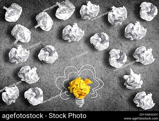 Inspiration concept with crumpled paper light bulb as good idea