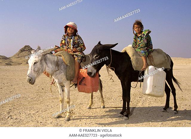 Bedouin Girls on Donkey at Zoser's Step Pyramid, Saqqara, Egypt