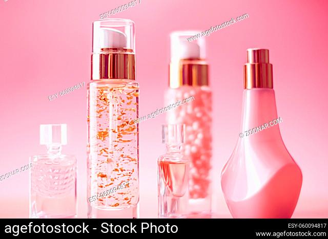 Beauty and cosmetic products on pink background