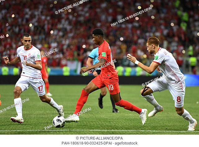 18 June 2018, Russia, Volgograd: Soccer: World Cup, Tunisia vs England, preliminary round, group G, Volgograd Stadium. Tunisia's Ellyes Skhiri (L) and...