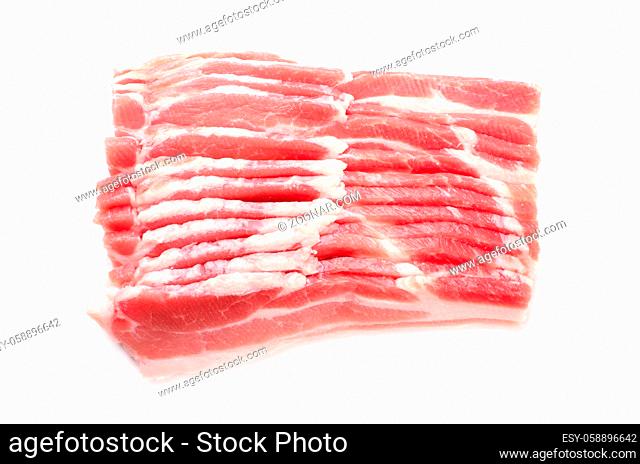Several slices of raw bacon isolated on a white background