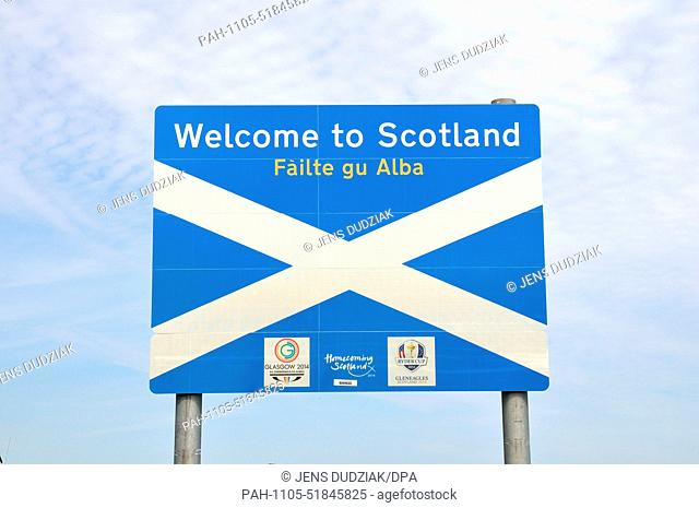 A sign reading ""Welcom to Scotland"" is posted at a rest area on the A1 at the English-Scottish border near Berwick-upon-Tweed, Britain, 11 July 2014