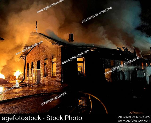 20 July 2023, North Rhine-Westphalia, Steinheim: A warehouse is on fire in the district of Höxter. A warehouse in the district of Höxter went up in flames on...