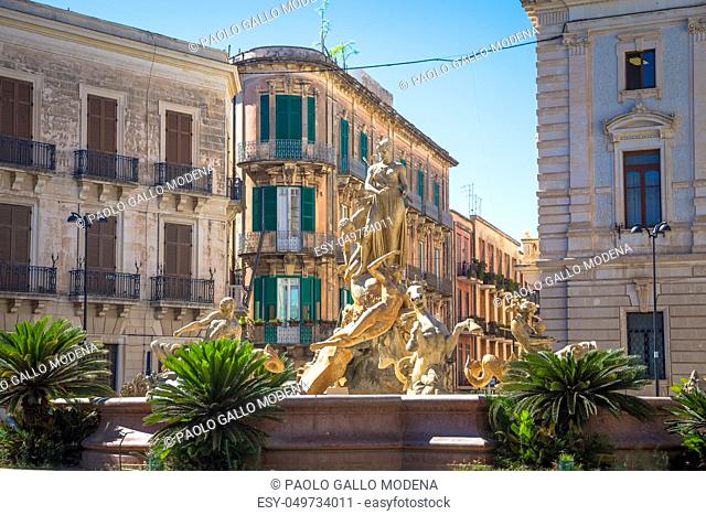 SYRACUSE, ITALY - MAY 18, 2018: Fontana di Diana (Diana's fountain) in Archimede's Square, historical area of Ortigia downtown in Syracuse