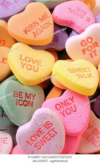Valentine candy hearts with messages on them