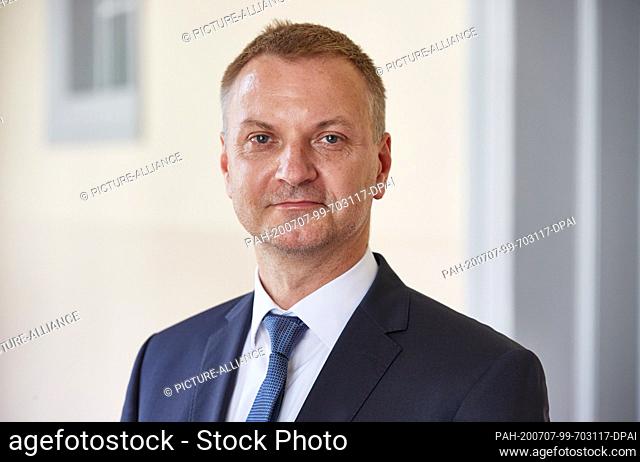 07 July 2020, Hamburg: Rajmund Niwinski, a lawyer, is standing in a corridor of the criminal justice building during a break in the trial