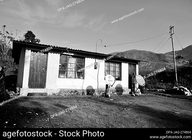 House with Airtel dish antenna, Munnar, Idukki, Kerala, India, Asia