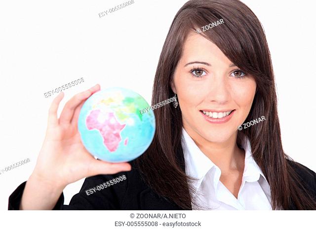 woman holding out world globe