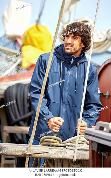 Sailor. Ropes sail of a sailboat, galleon. Basque Country. Spain