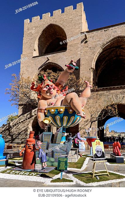 Grotesque Papier Mache figure at the Serranos Towers during Las Fallas festival