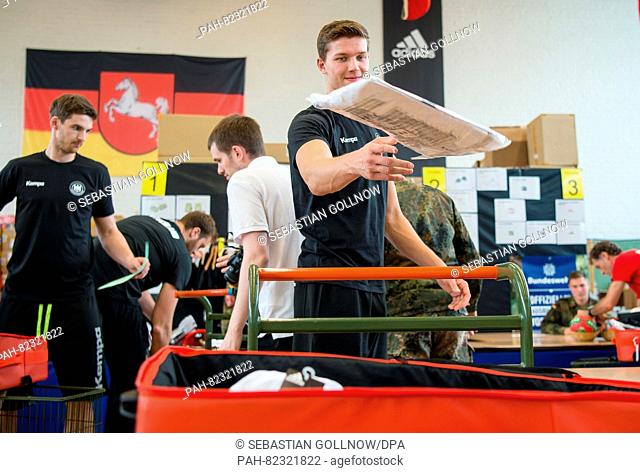 Handball player Christian Dissinger during the outfitting of the German Handball team for Rio 2016 in Hanover, Germany, 27 July 2016