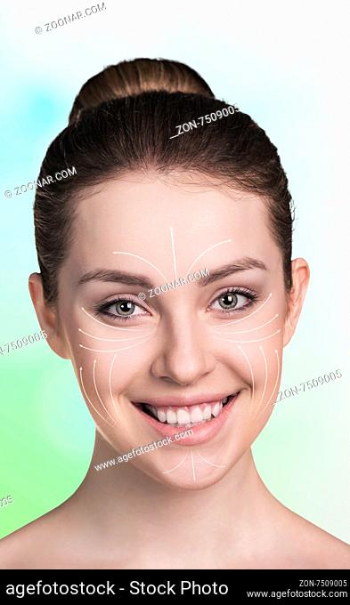 Young happy female with clean fresh skin, white background