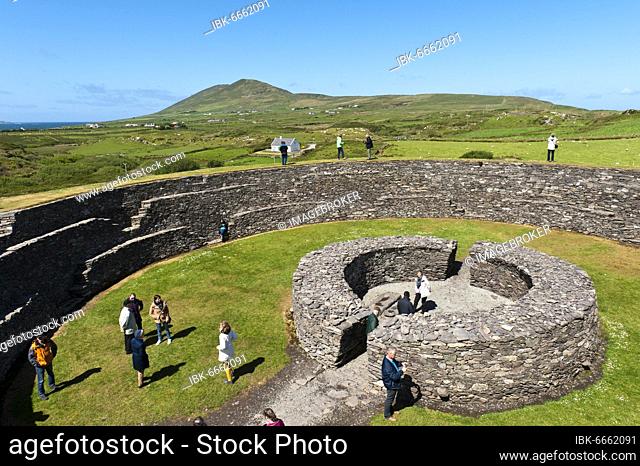 Archaeology, tourists, iron age ring fort Cahergall, Cahersiveen, Ring of Kerry, County Kerry, Ireland, Europe