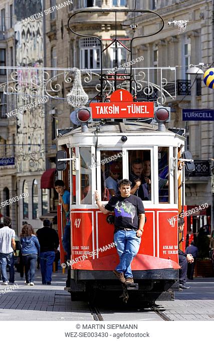 Turkey, Istanbul, Historical tram runs along Istiklal Caddesi