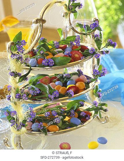 Tiered silver stand with coloured sugar eggs & forget-me-nots