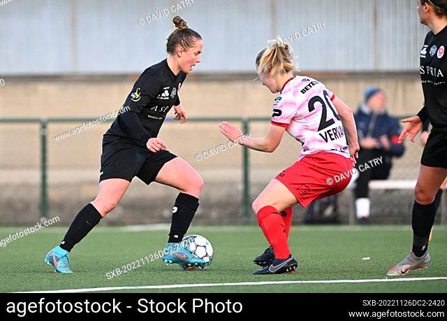 Stefanie Deville (14) of Woluwe pictured with Laura Vervacke (20) of Zulte-Waregem during a female soccer game between SV Zulte - Waregem and WS Woluwe on the...