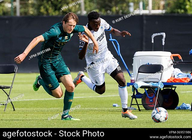 Beerschot's Axl Van Himbeeck and Club's Kamal Sowah fight for the ball during a friendly soccer match between Club Brugge KV and Beerschot VA