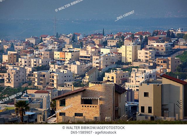 Israel, The Galilee, Nazareth, elevated city view, dusk