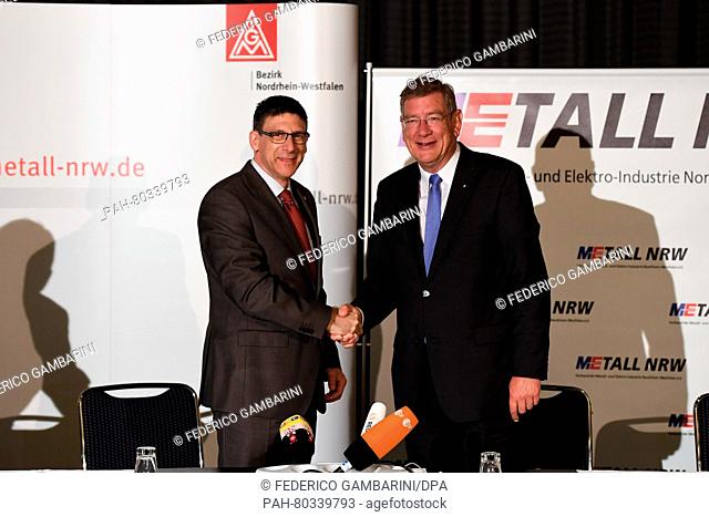 Knut Giesler (l), chief negotiator of IG Metall union, and Arndt Kirchhoff, president of the association of the metal and electrical industry in North...