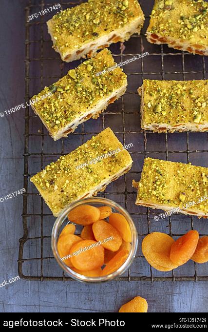 Dessert layer bars with dried apricots and pistachios