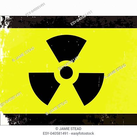 A worn Caution Radiation symbol in yellow and black